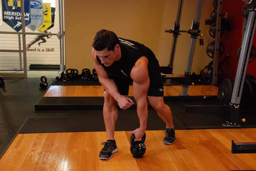 Remo con Kettlebell a un brazo - Posición 1